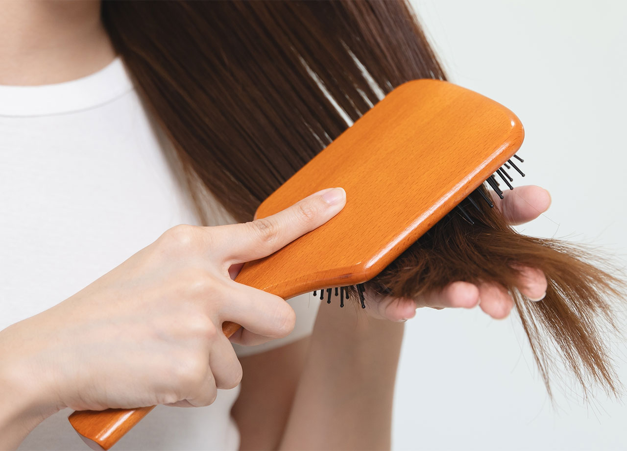 woman-brushing-hair