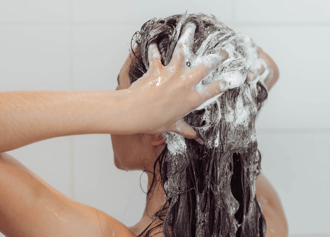 woman-shampooing-hair