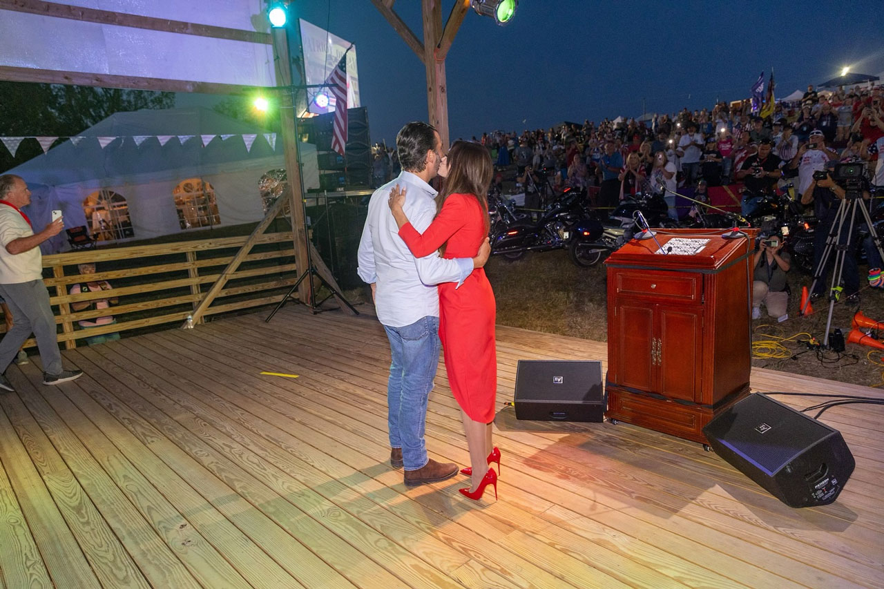 Kimberly Guilfoyle and Donald Trump Jr. kiss at Patriot's Day Freedom Fest