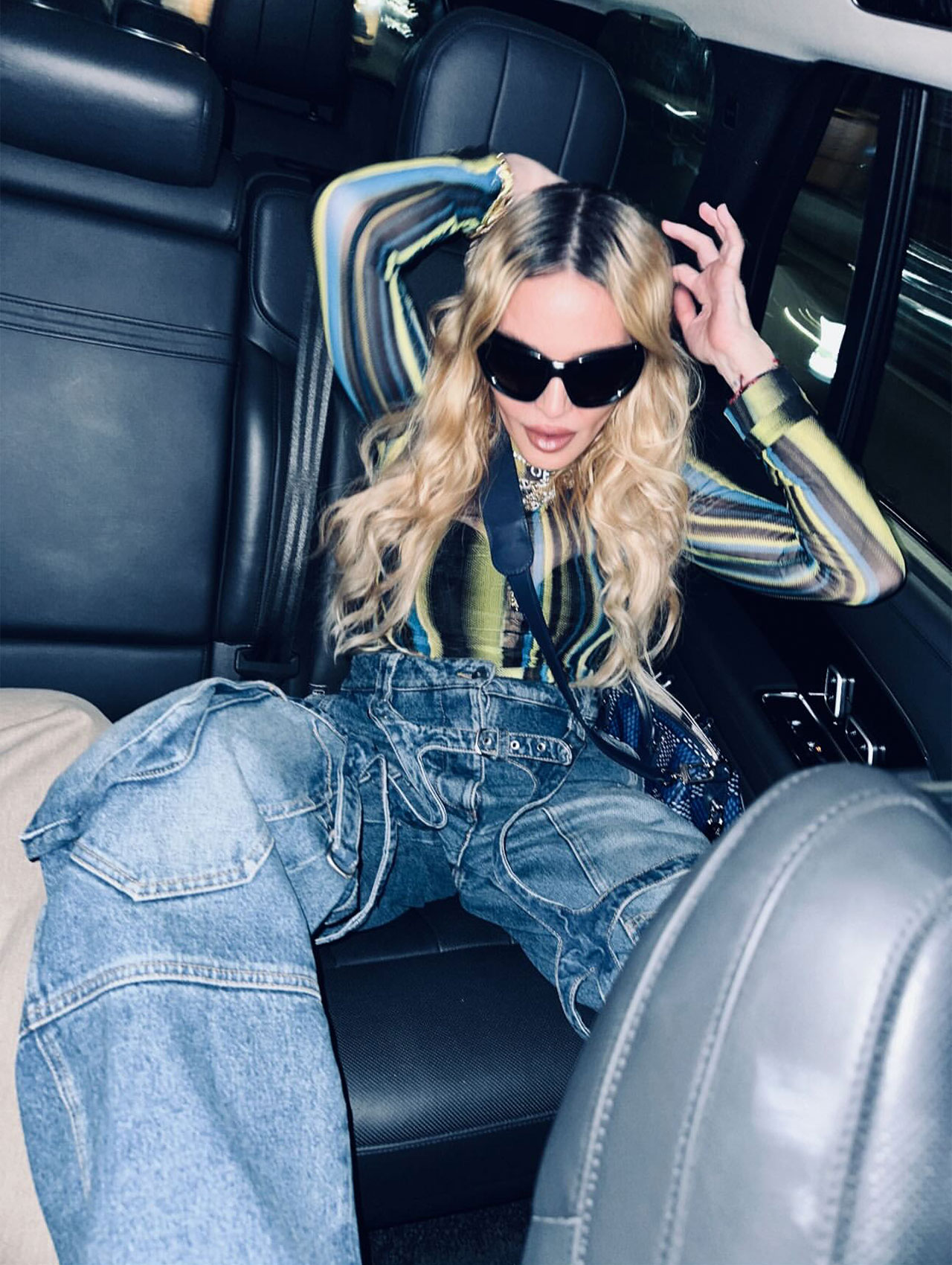 Madonna backseat sheer striped shirt Instagram picture