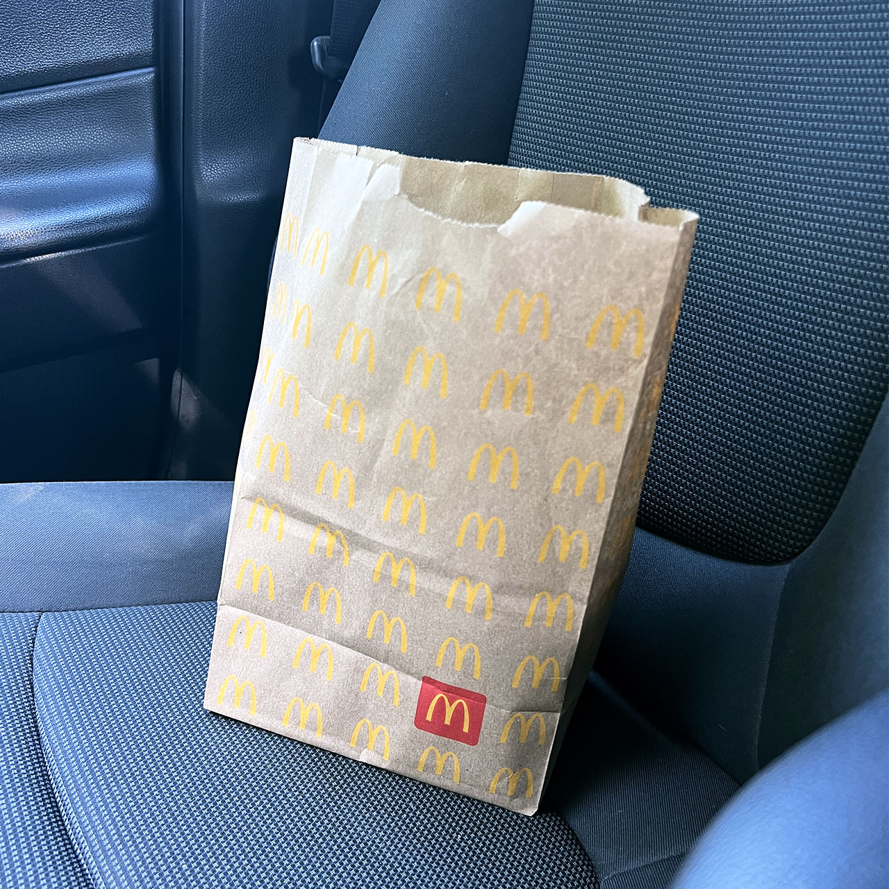 mcdonalds bag on carseat