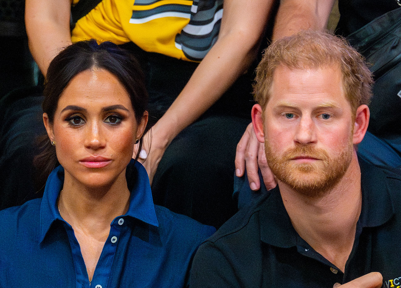 Meghan Markle and Prince Harry not smiling