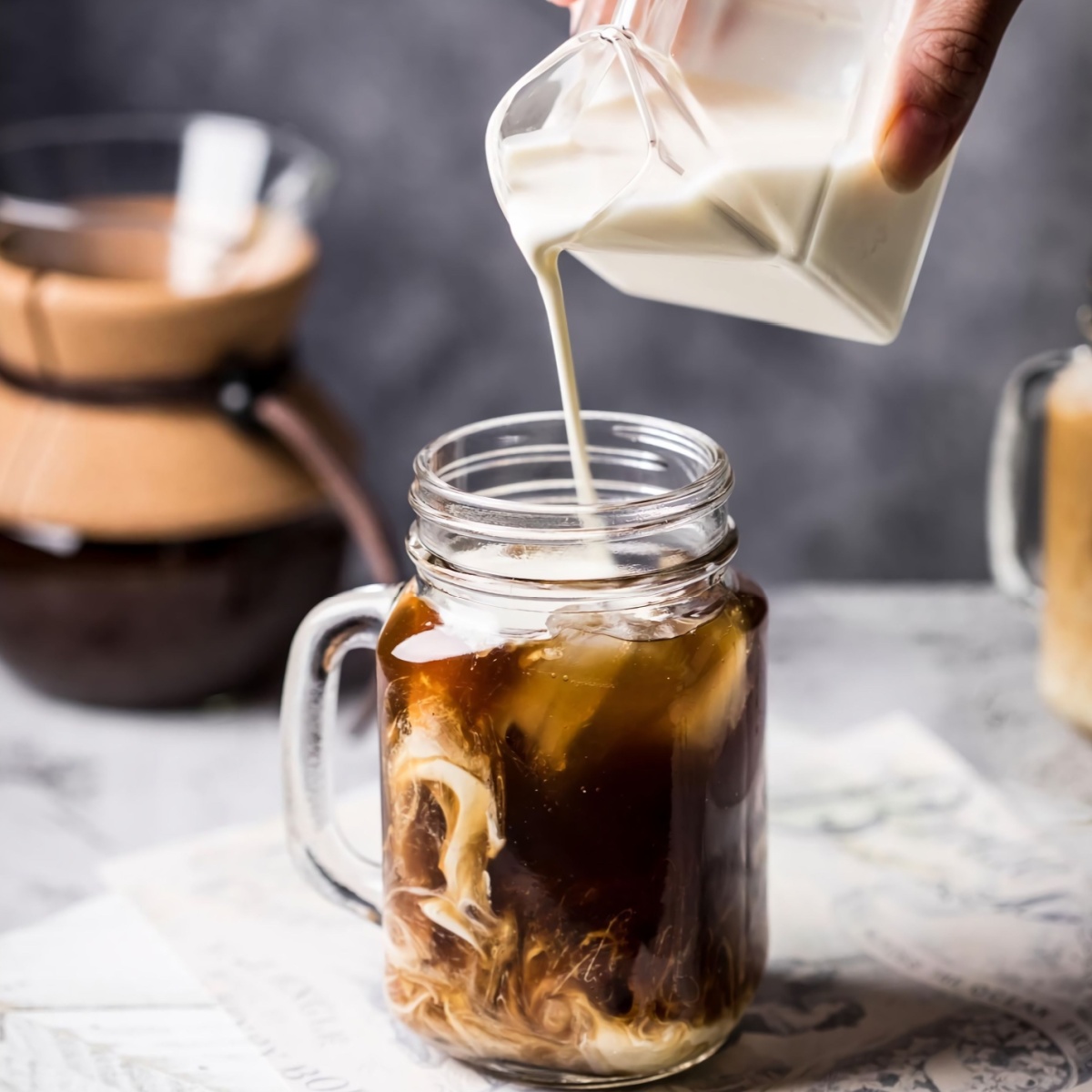 creamer poured into coffee