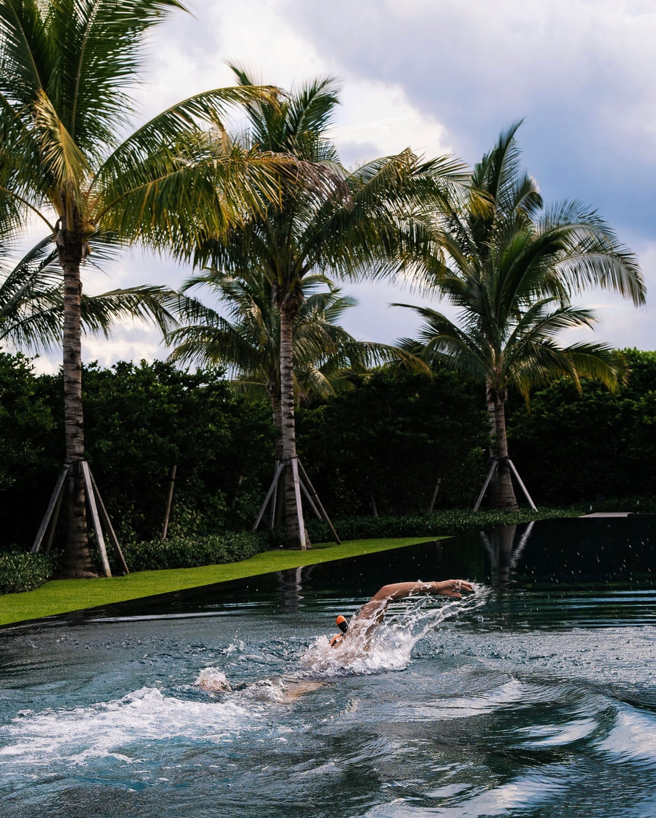 Tom Brady working out at home swimming