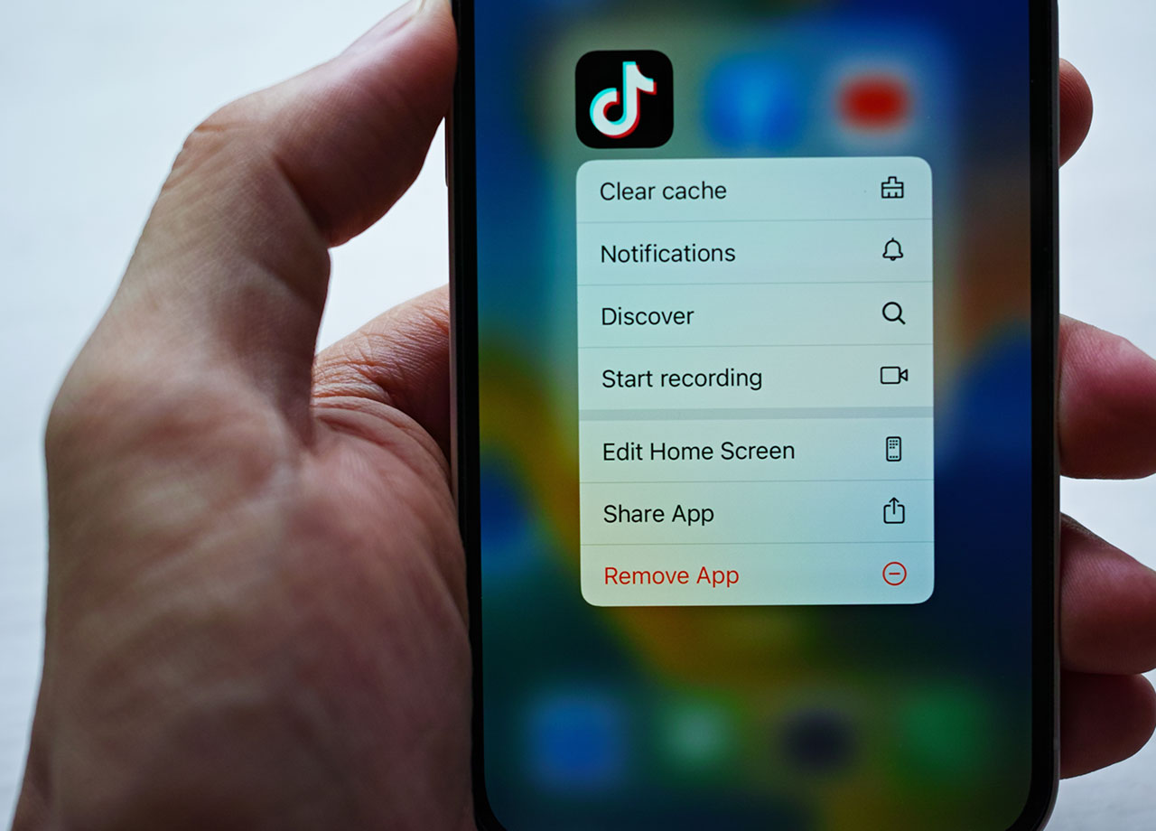 man-holding-iphone-delete-tiktok