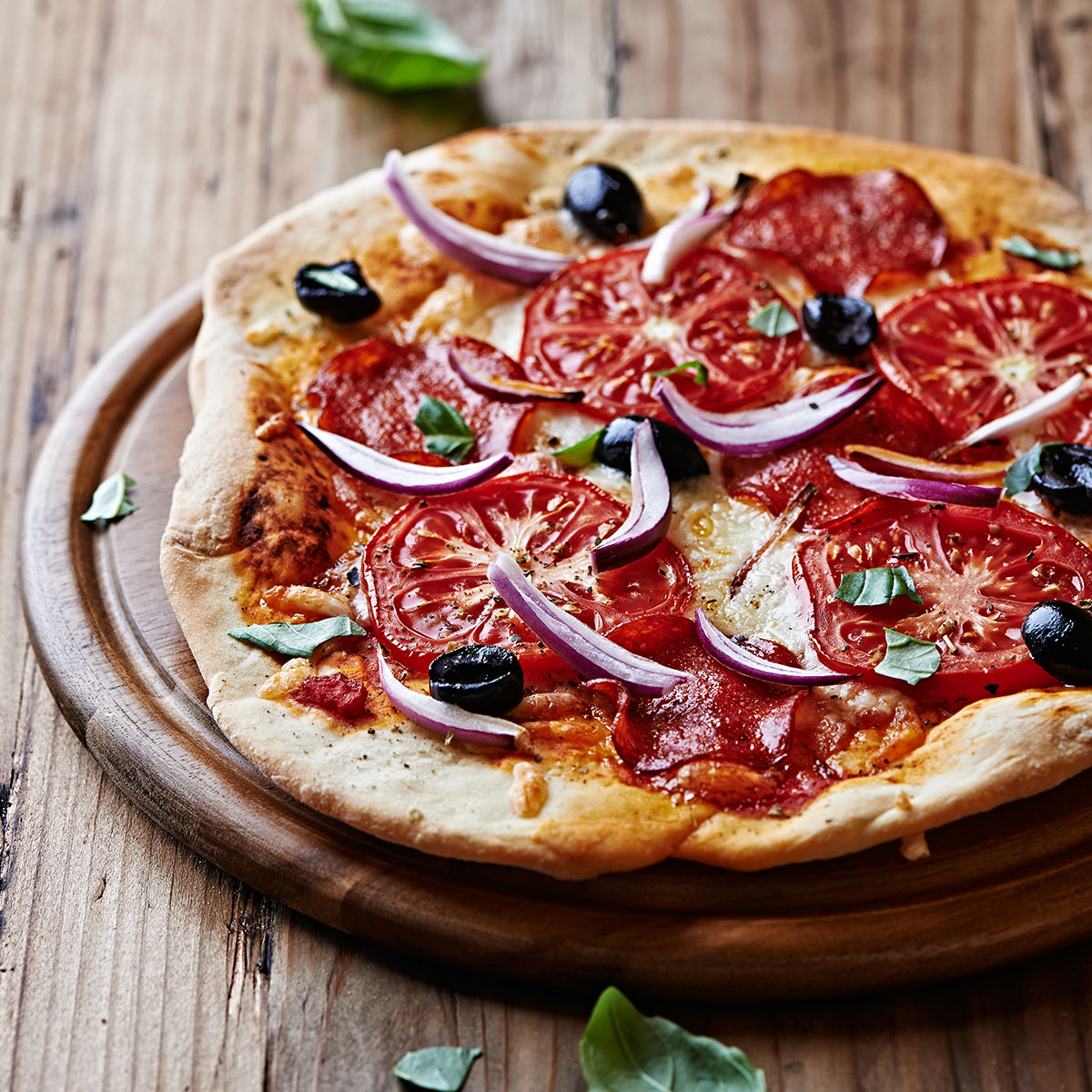 pizza with tomatoes and onions