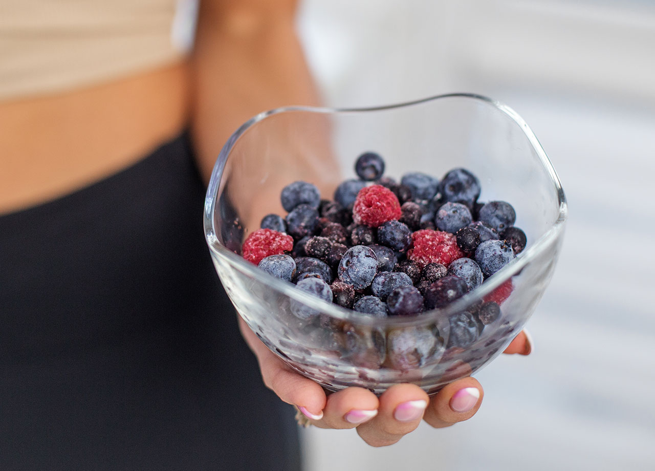 woman-holding-berries