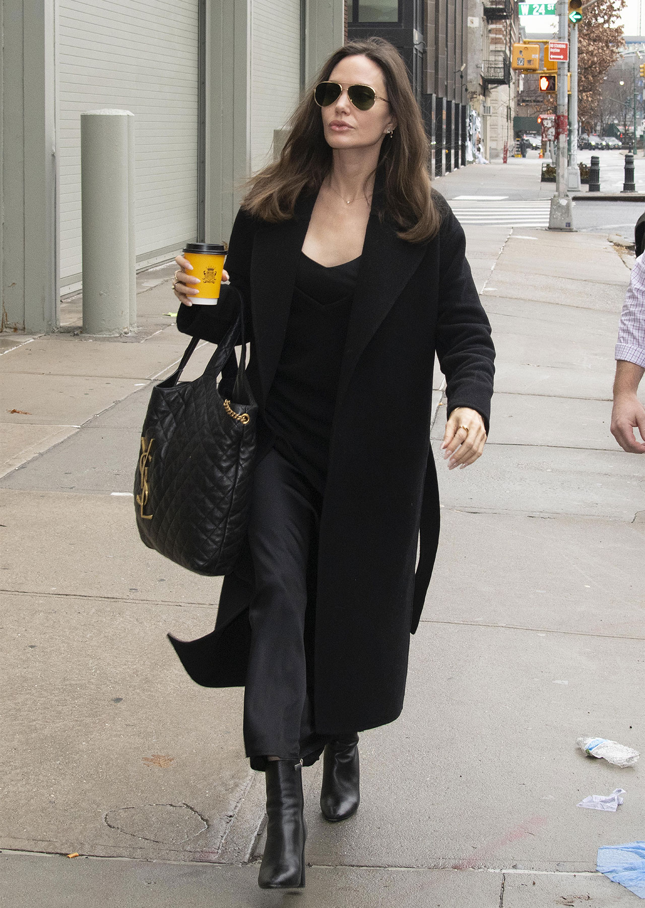 Angelina Jolie Chelsea Art Center black outfit YSL tote bag