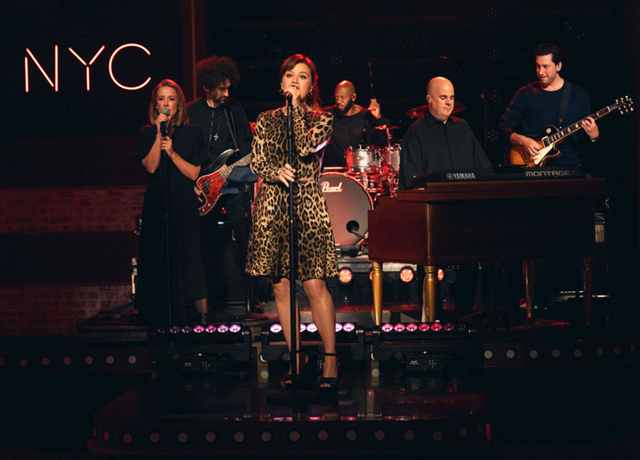 Kelly Clarkson leopard print Dolce and Gabbana dress performing on The Kelly Clarkson Show