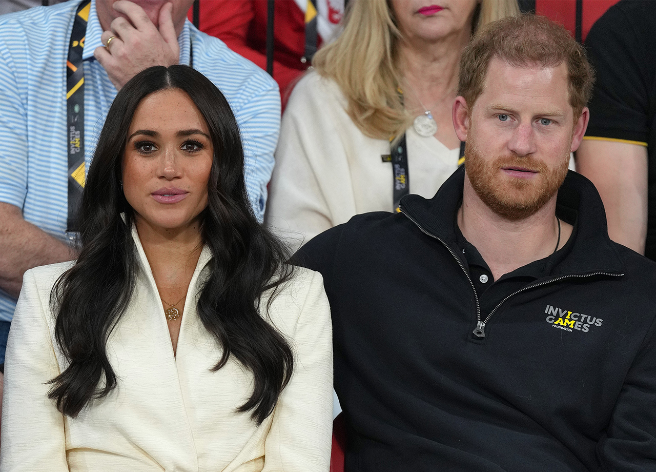 Prince Harry and Meghan Markle watch seated volleyball Invictus Games