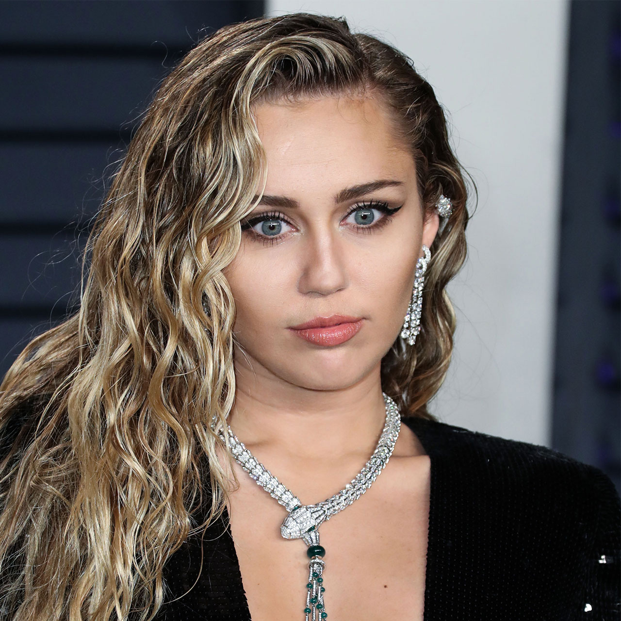 Miley Cyrus Stuns In New Dolce & Gabbana Campaign In Lace Lingerie And Slicked-Back Hair As Fans React: 'She Can’t Stop Serving'