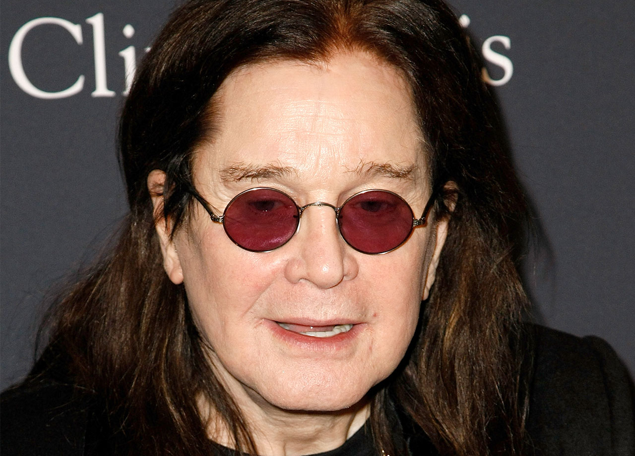 Ozzy Osbourne red round glasses