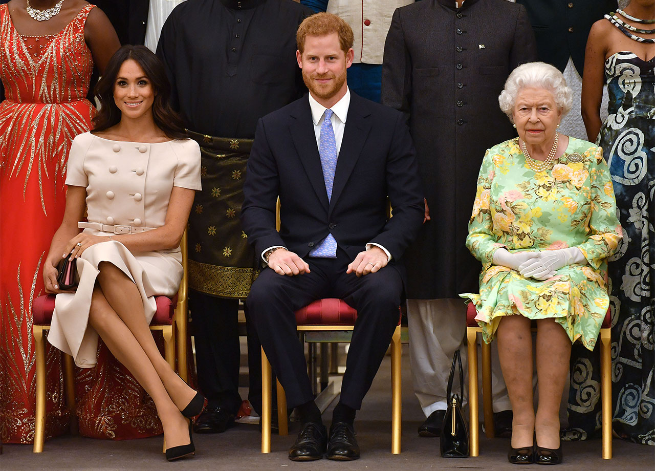 Queen Elizabeth II with Prince Harry and Meghan Markle in 2018