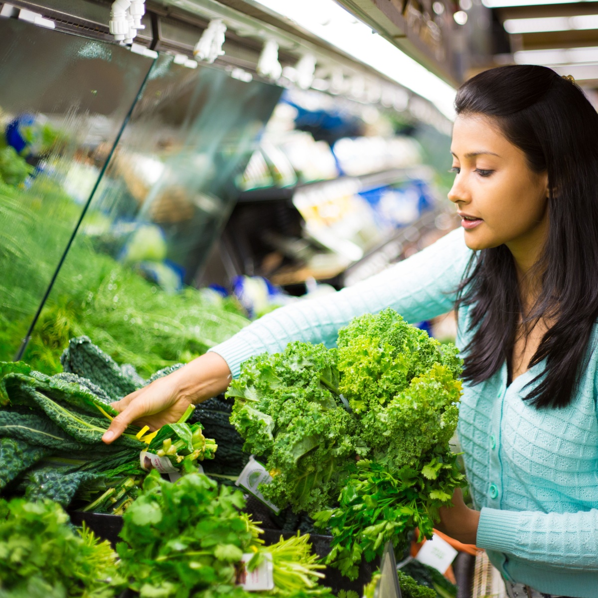 woman shopping for greens