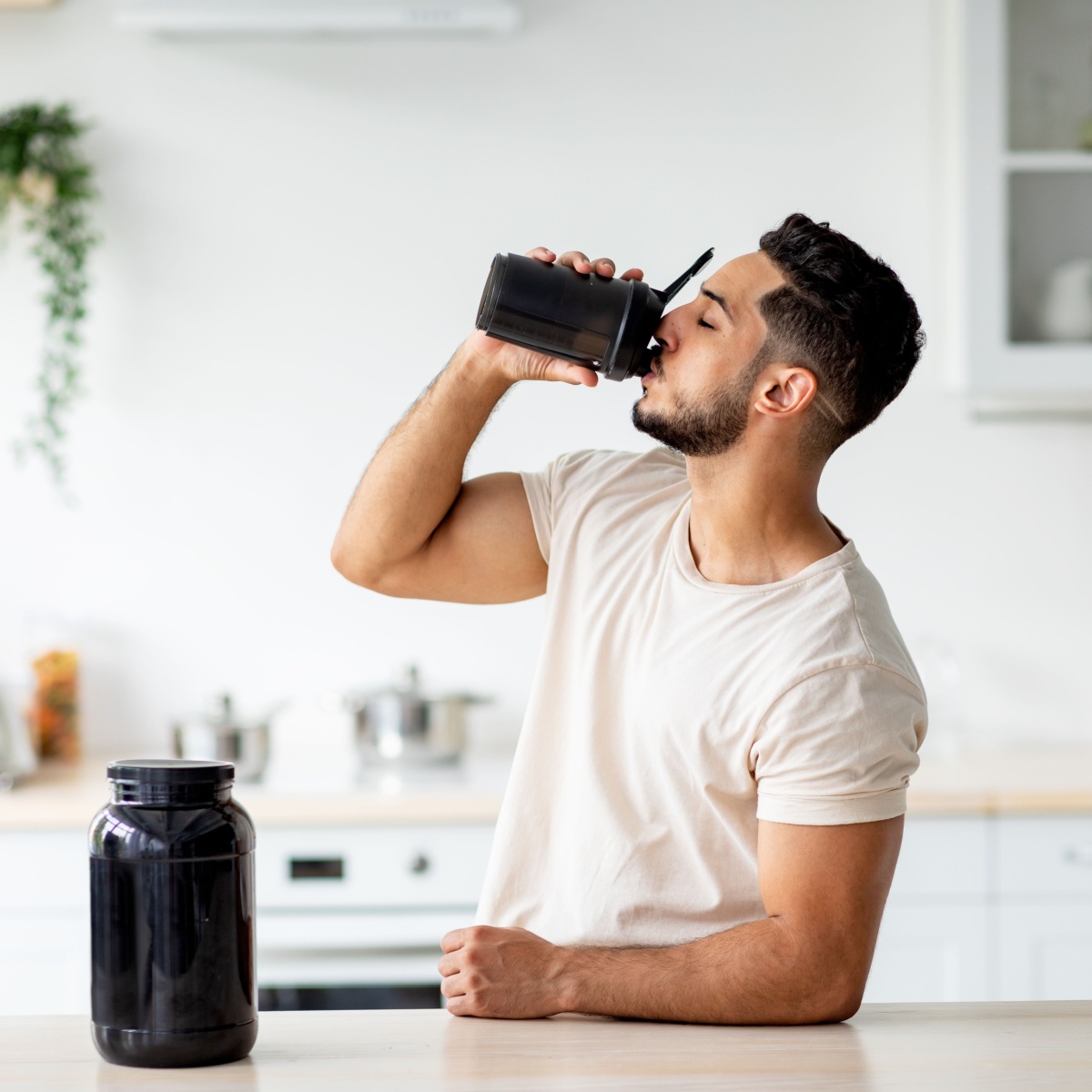 man drinking shake