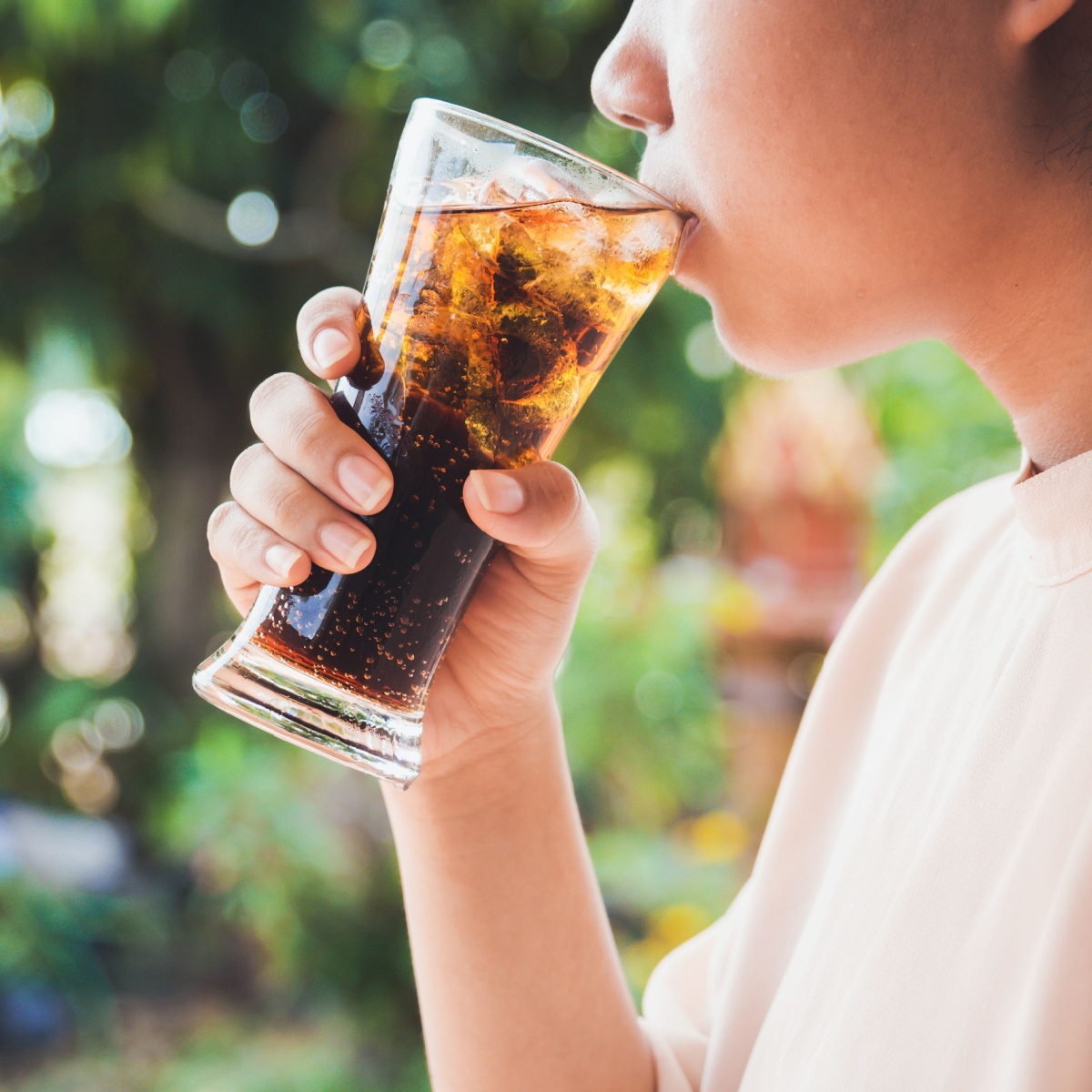 woman drinking soda