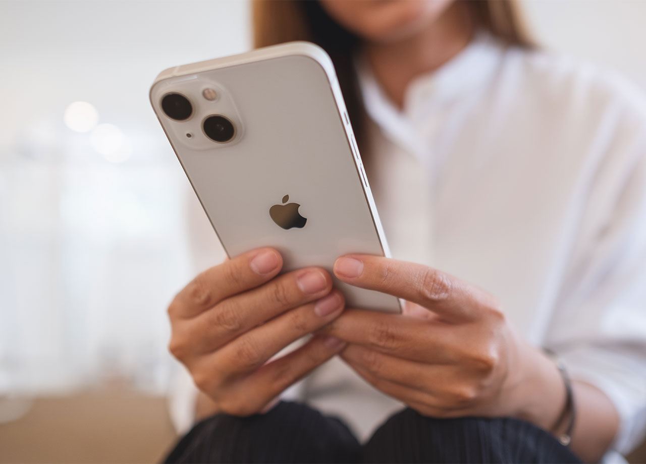 woman-using-white-iphone