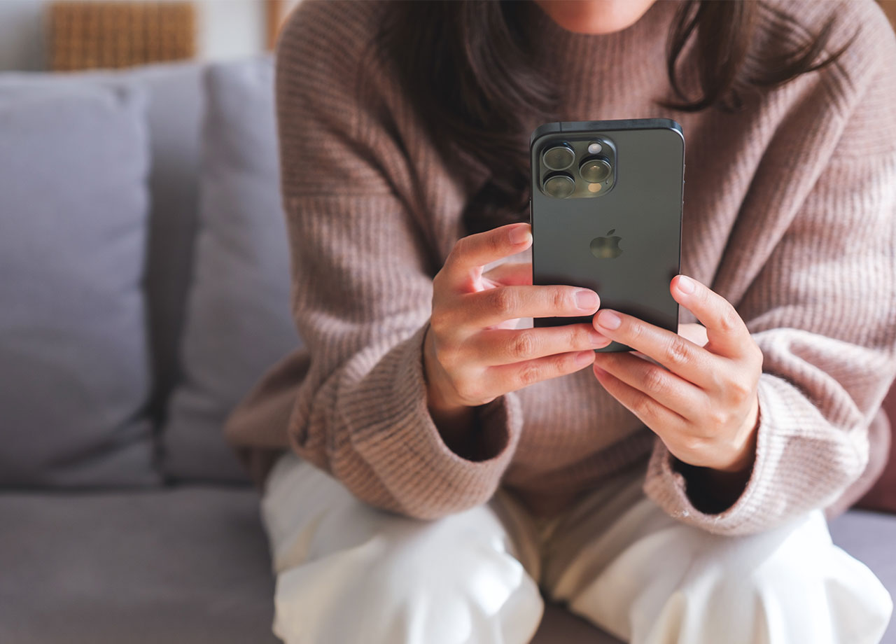 woman-using-black-iphone