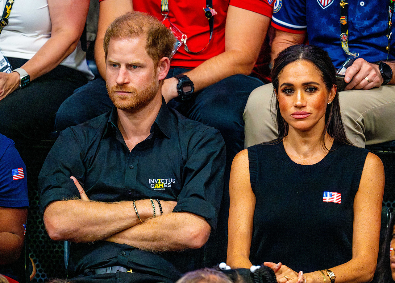 Prince Harry and Meghan Markle looking upset