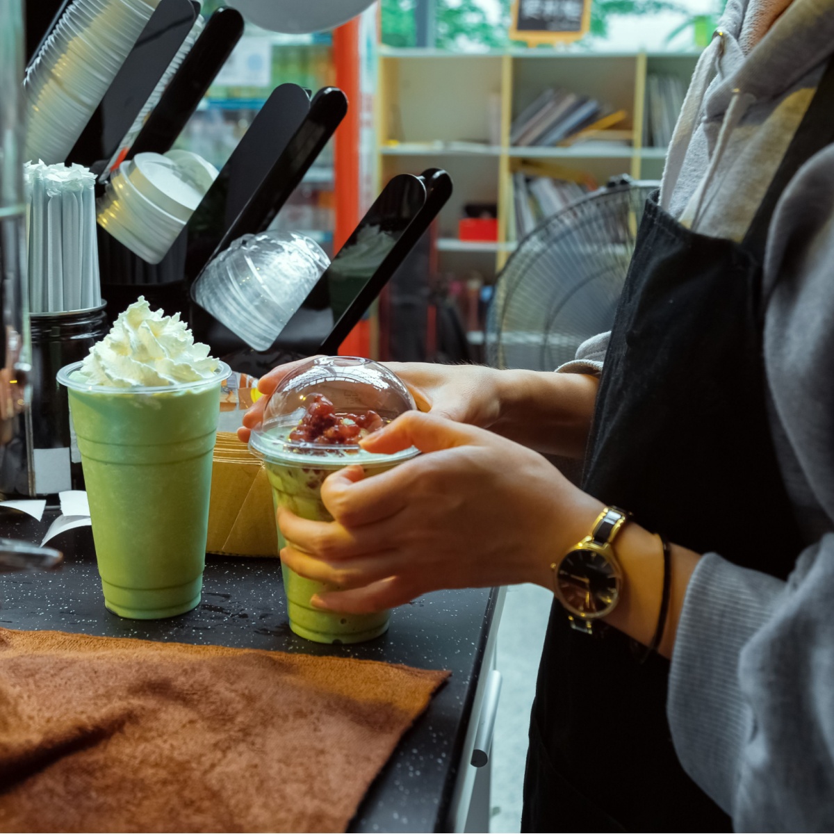 barista making coffee