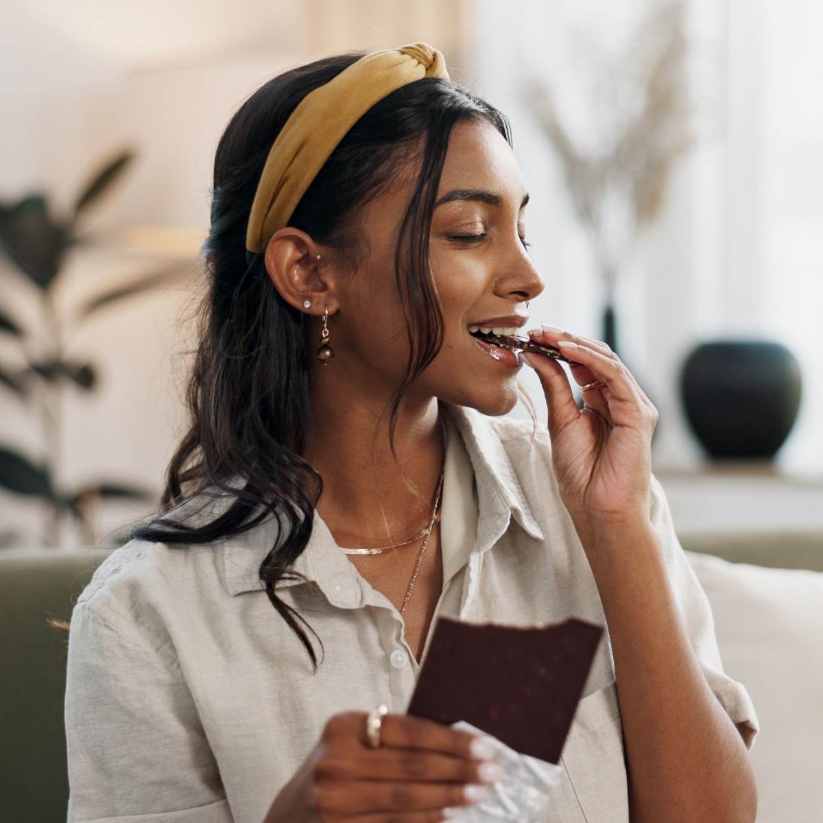 woman eating dark chocolate