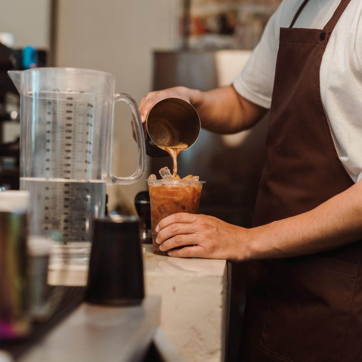 barista making coffee