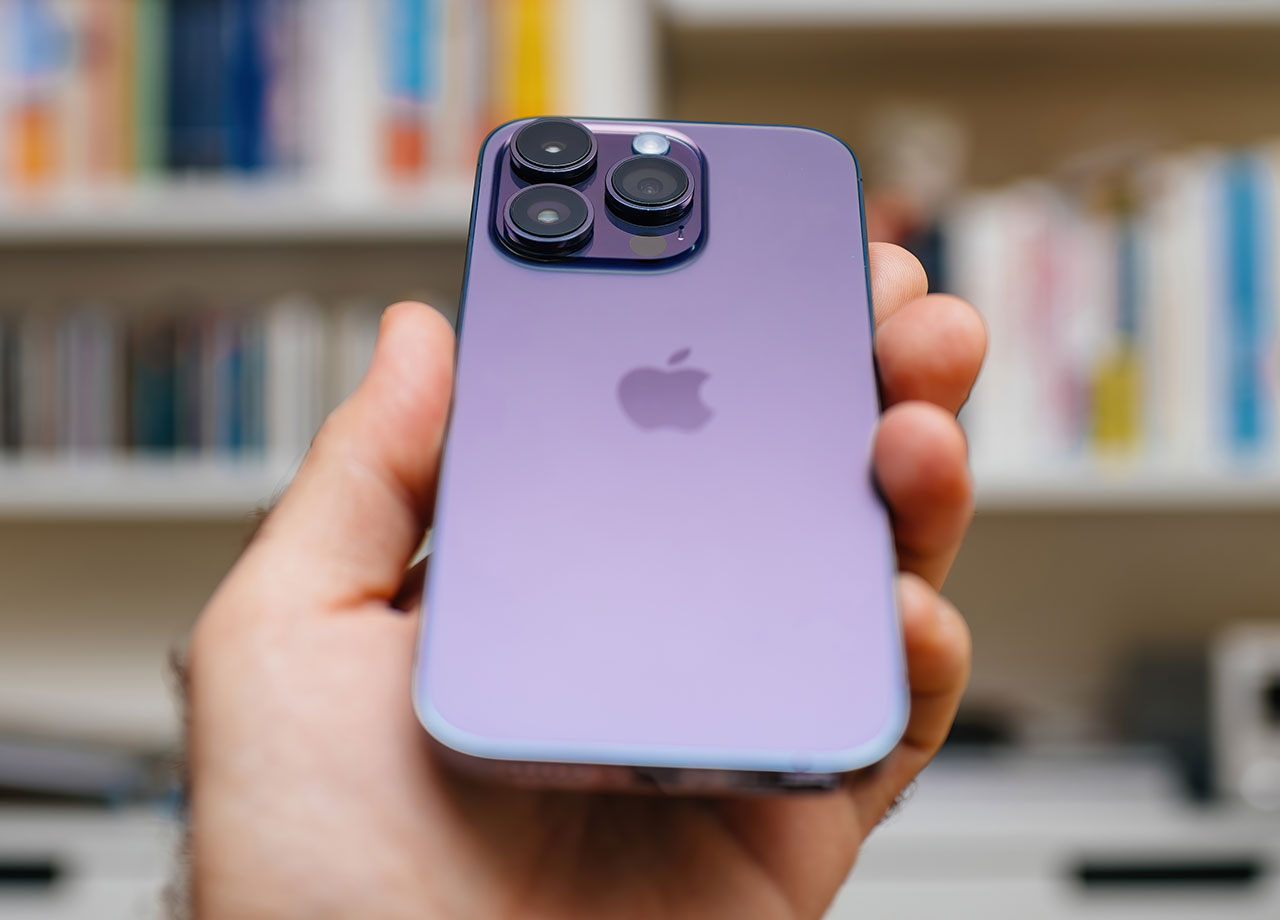 holding-purple-iphone