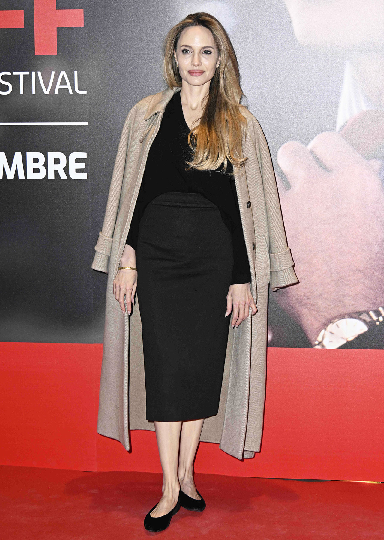 Angelina Jolie Torino Film Festival red carpet black dress and ballet flats