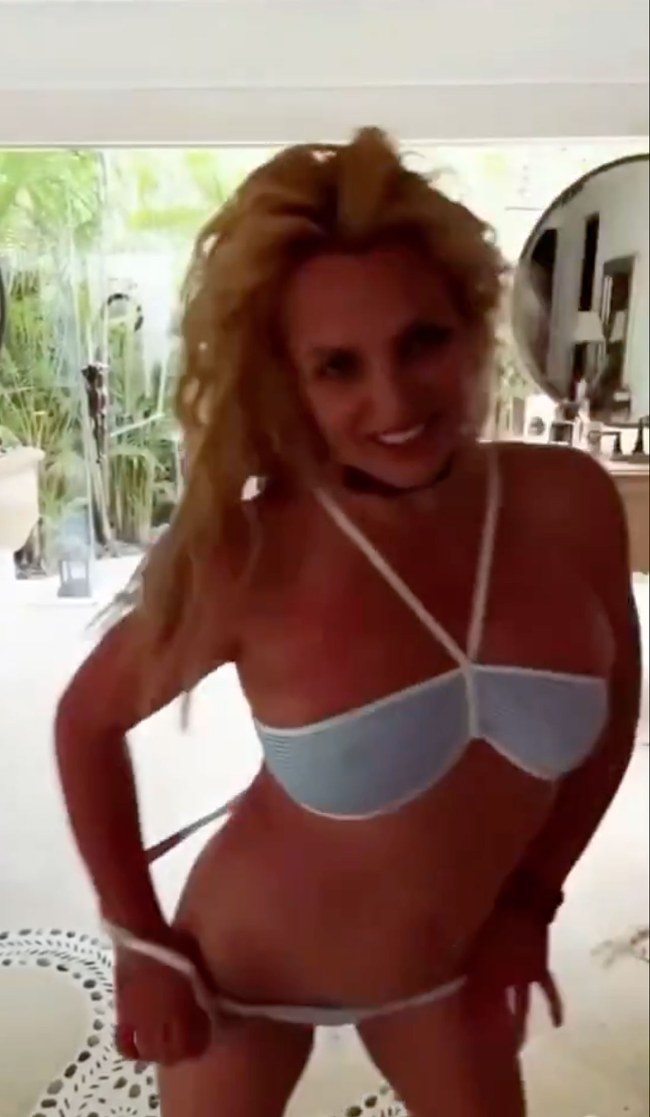 Britney Spears dancing in blue bikini in Mexico hotel