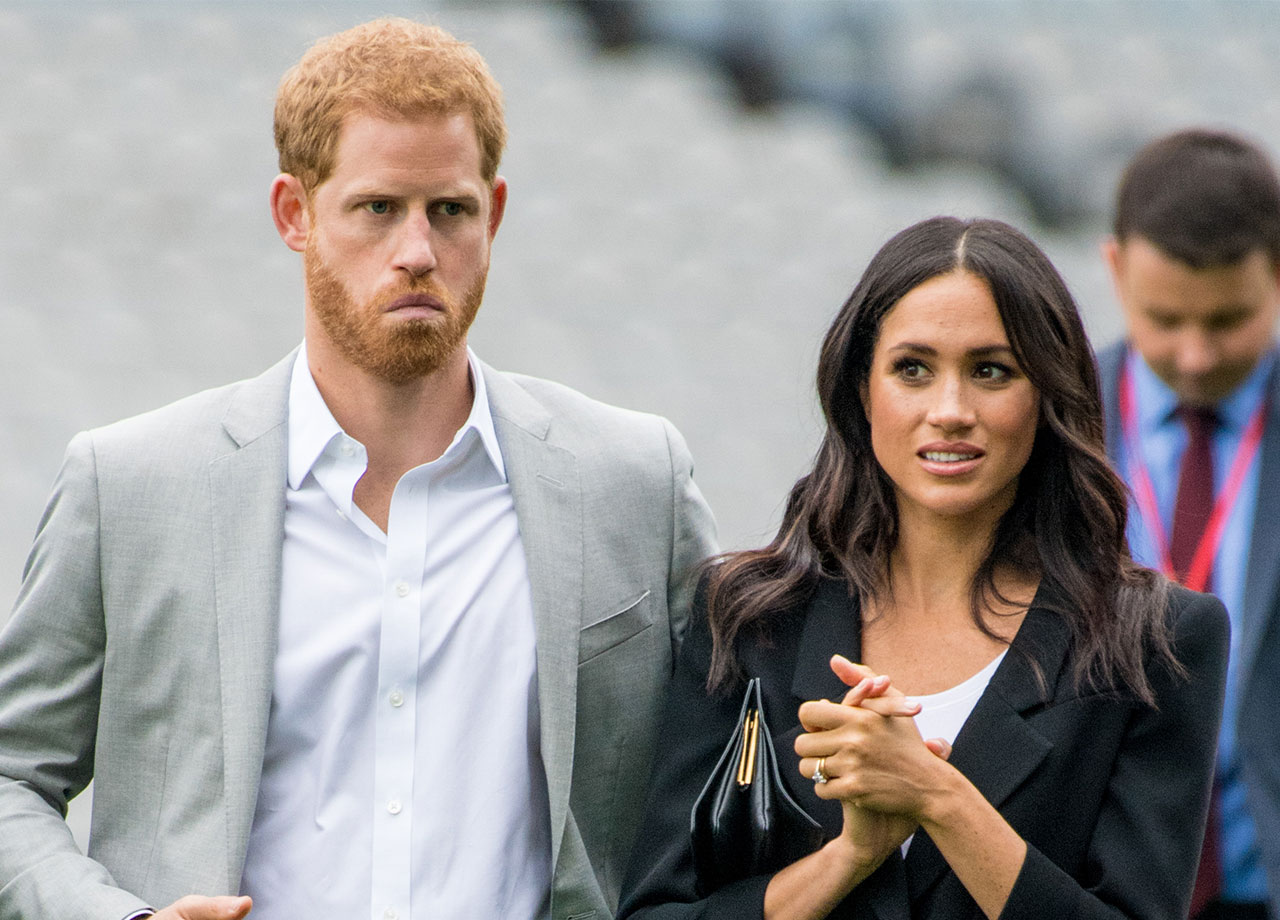 Prince Harry and Meghan Markle looking unfriendly