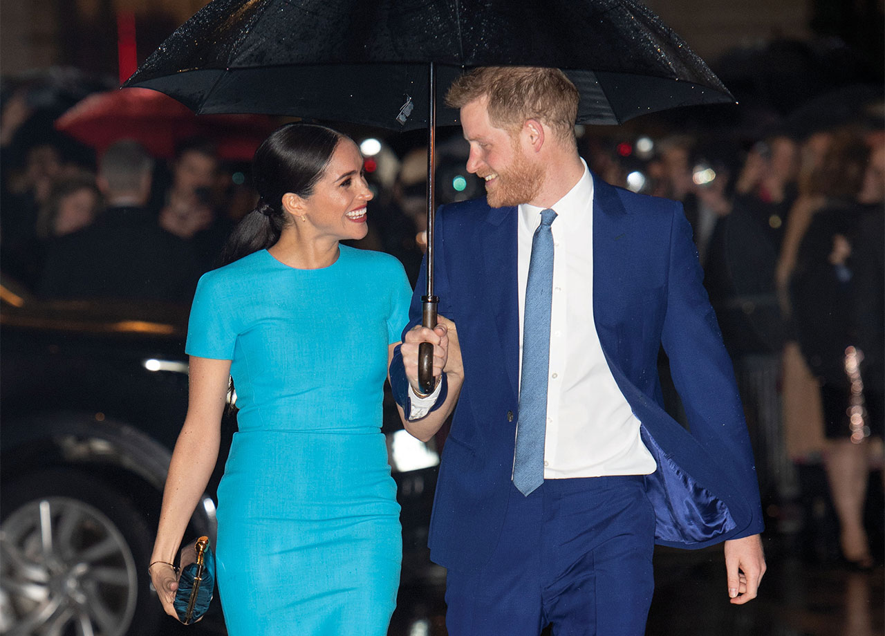 Prince Harry and Meghan Markle looking happy