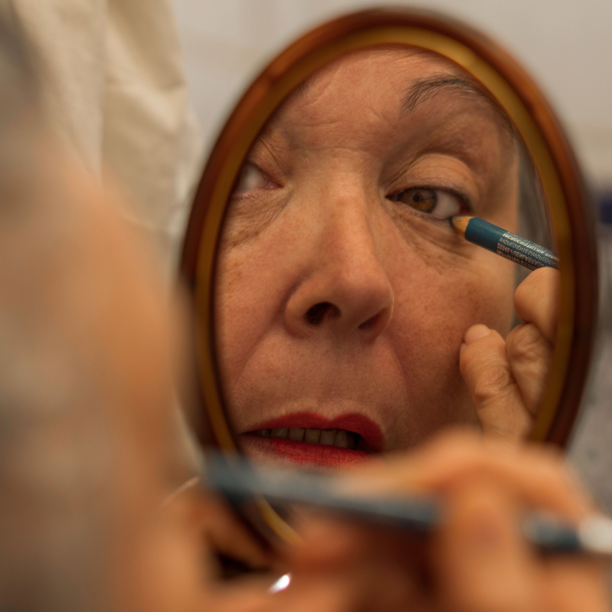 older woman wearing eyeliner