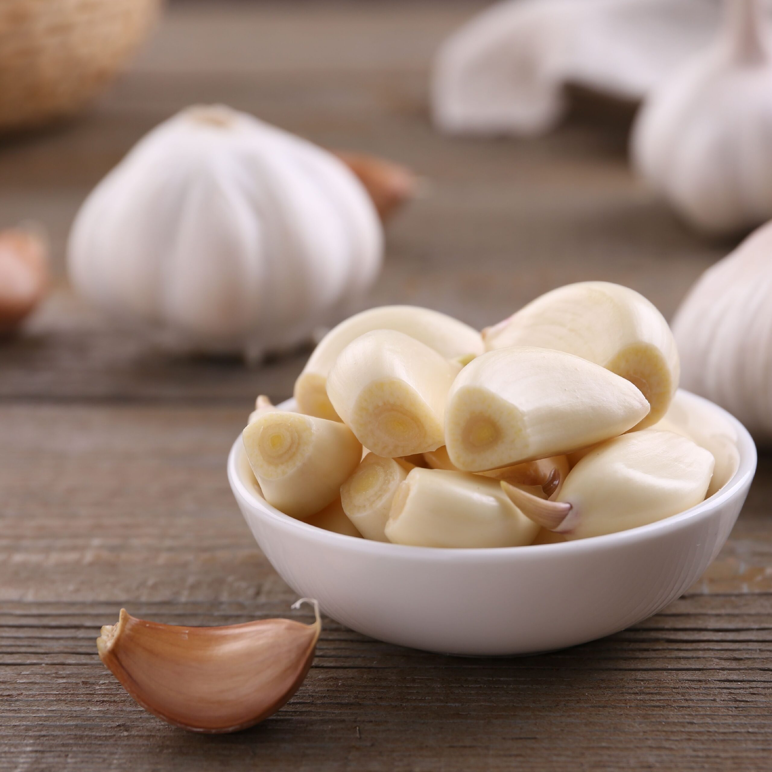 peeled garlic cloves in bowl