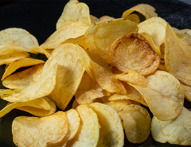 potato chips black background