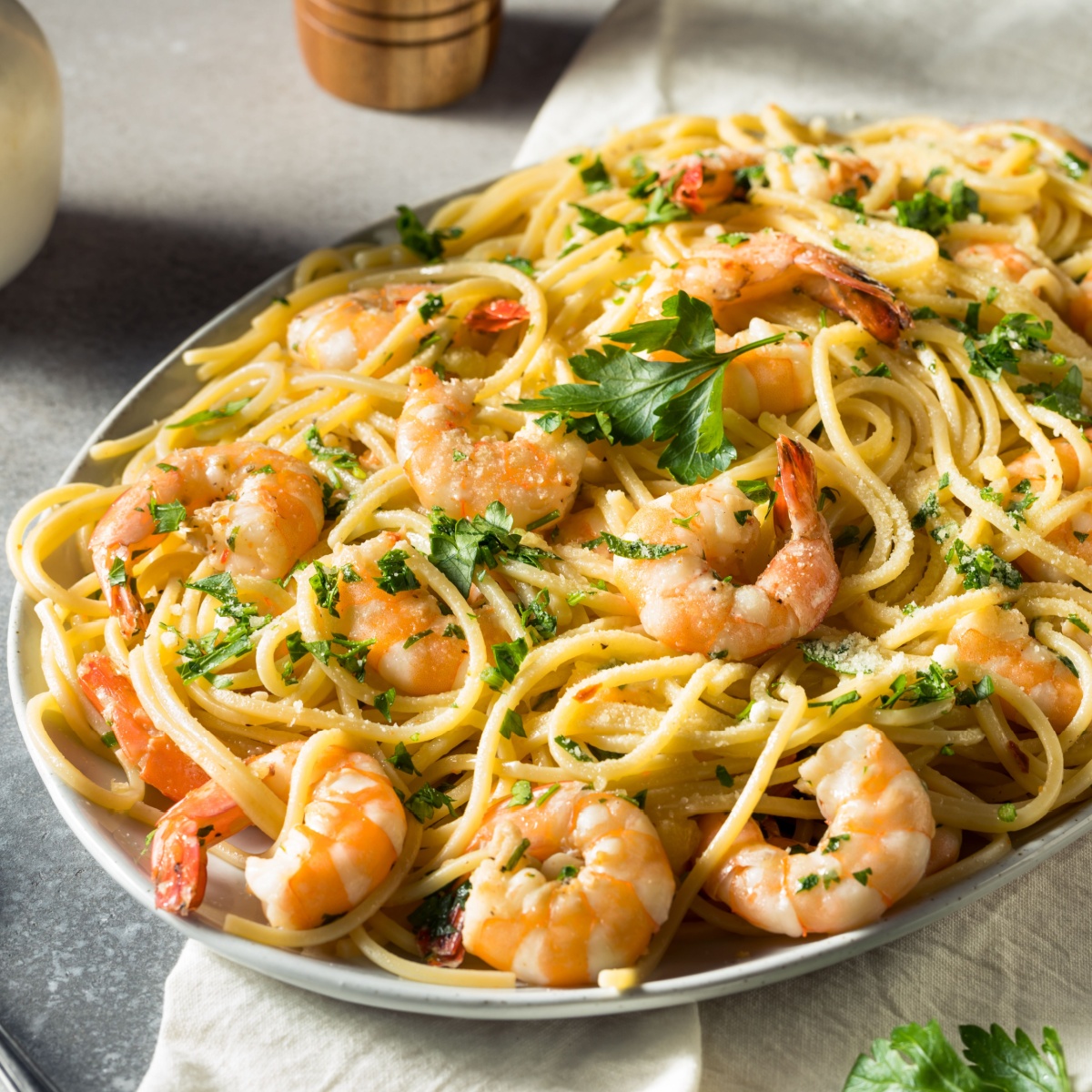 shrimp scampi noodles spaghetti parsely plate