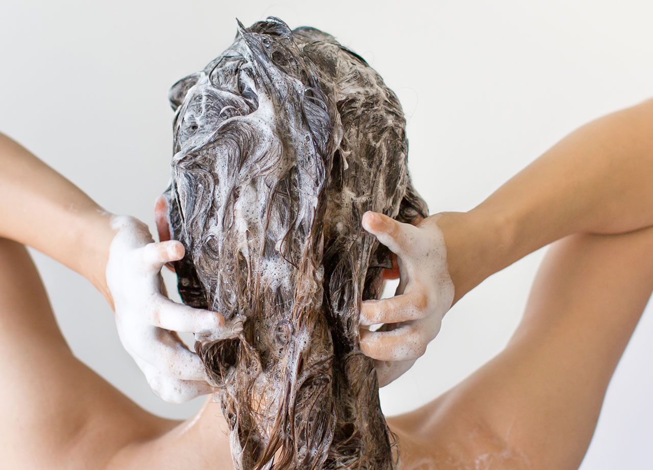 woman-shampooing-hair