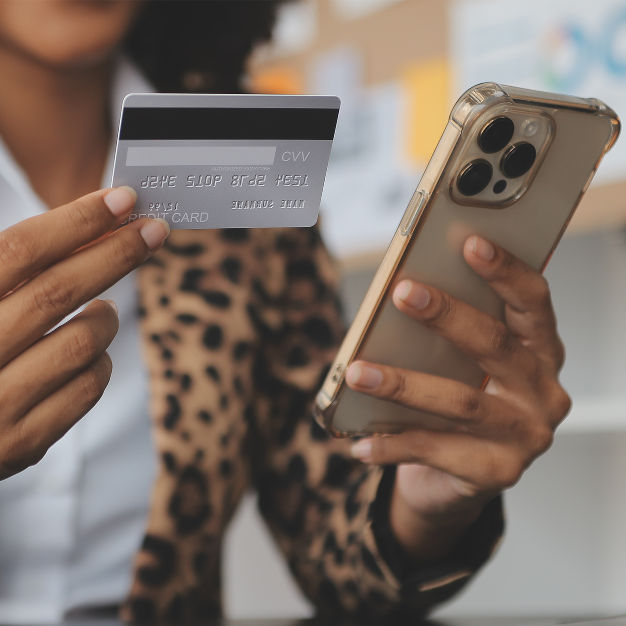 woman-using-credit-card-iphone