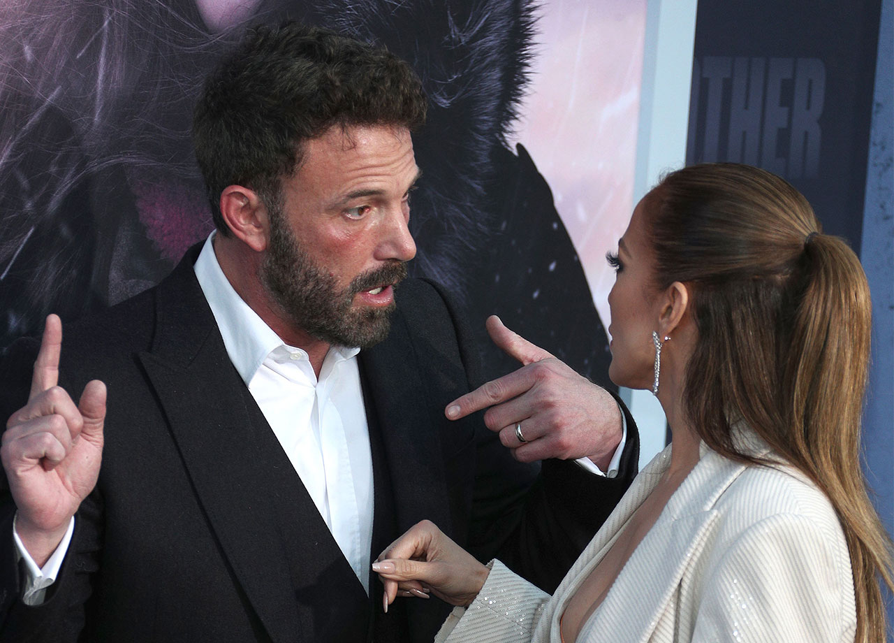 Jennifer Lopez and Ben Affleck arguing on the red carpet