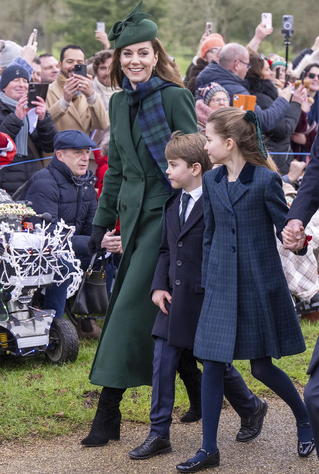 Kate Middleton with Prince Louis and Princess Charlotte at St. Mary Magdalene Church In Sandringham Christmas Day