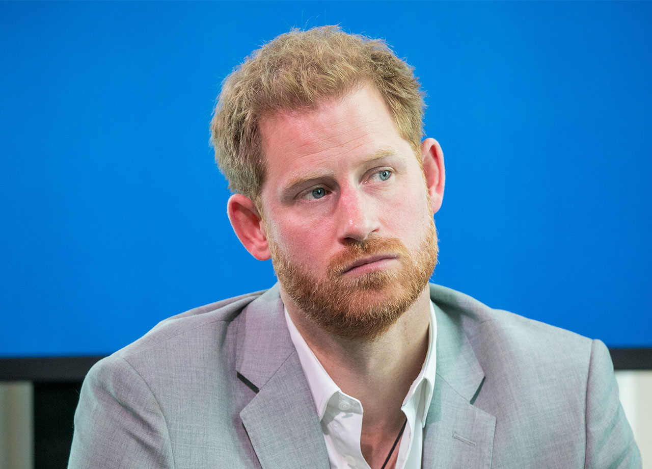 Prince Harry in gray blazer