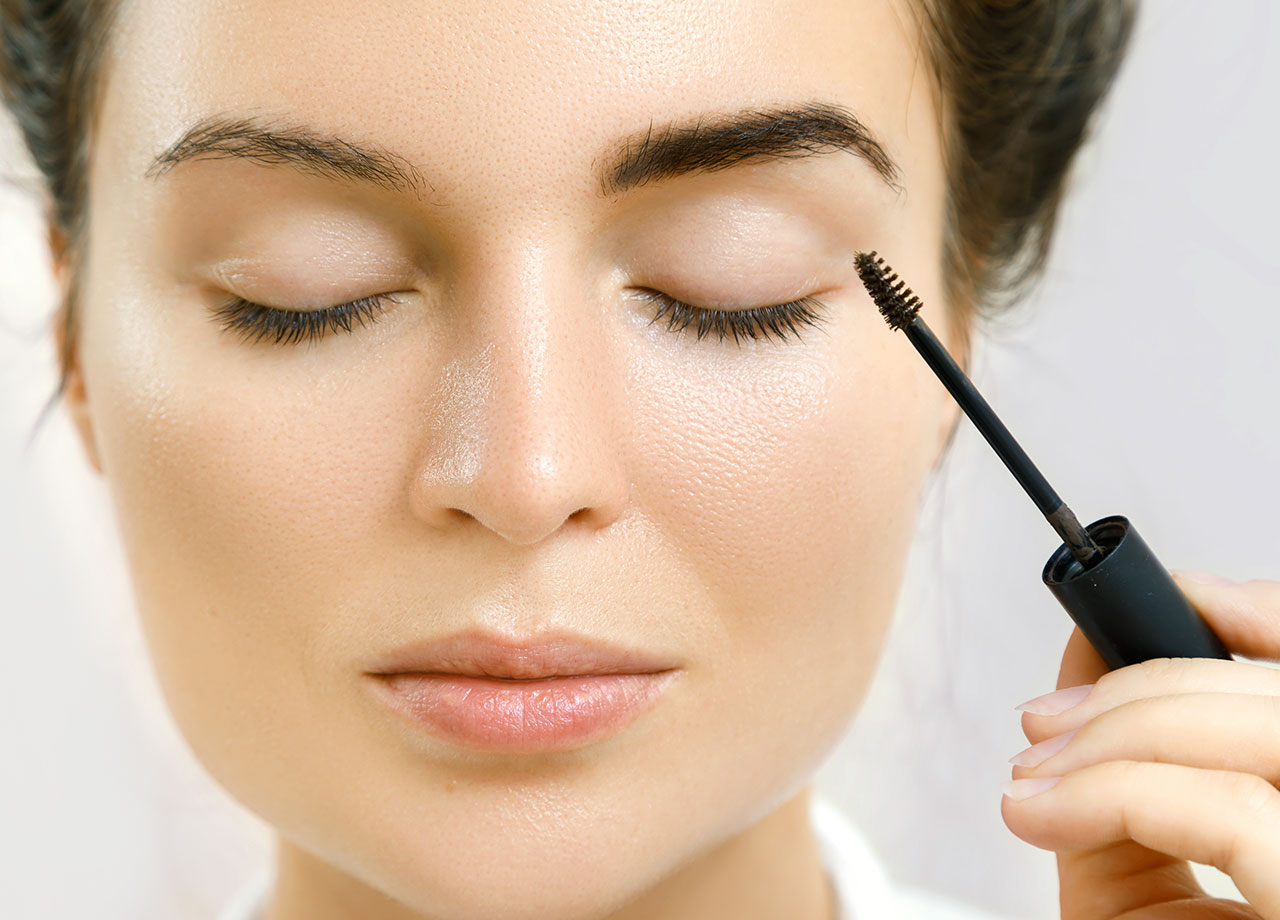 woman-applying-brow-gel