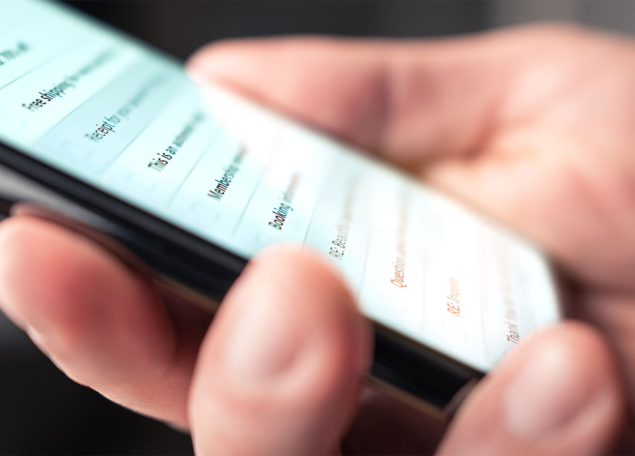 person-reading-scam-texts