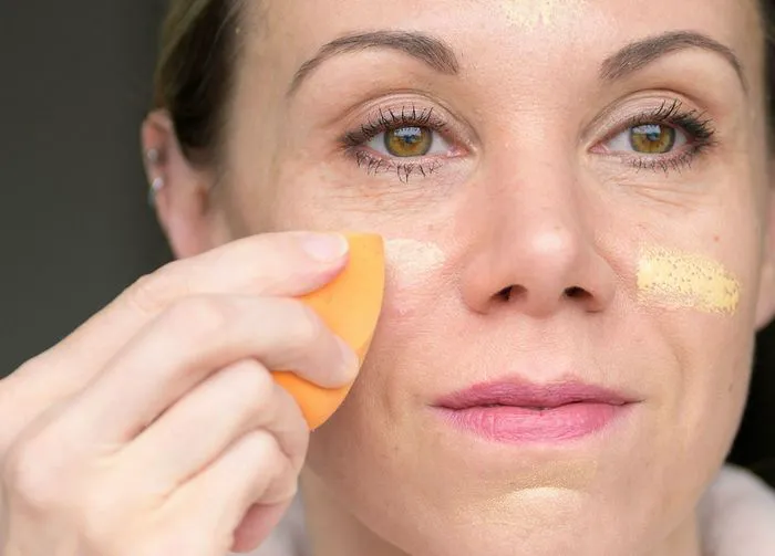 woman-applying-foundation