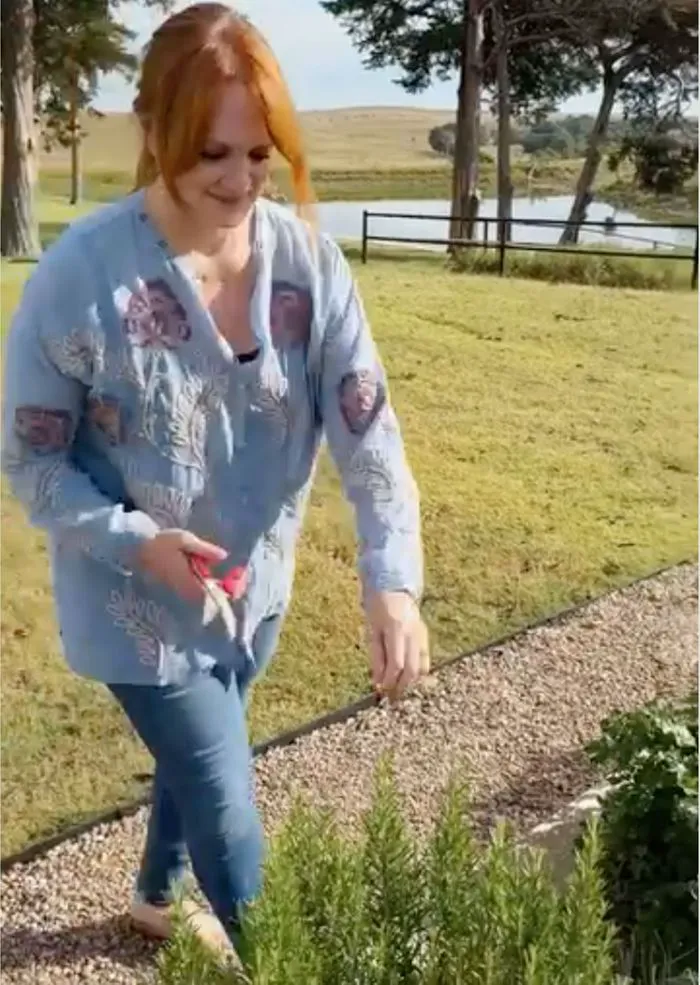 Ree Drummond picking rosemary on Instagram