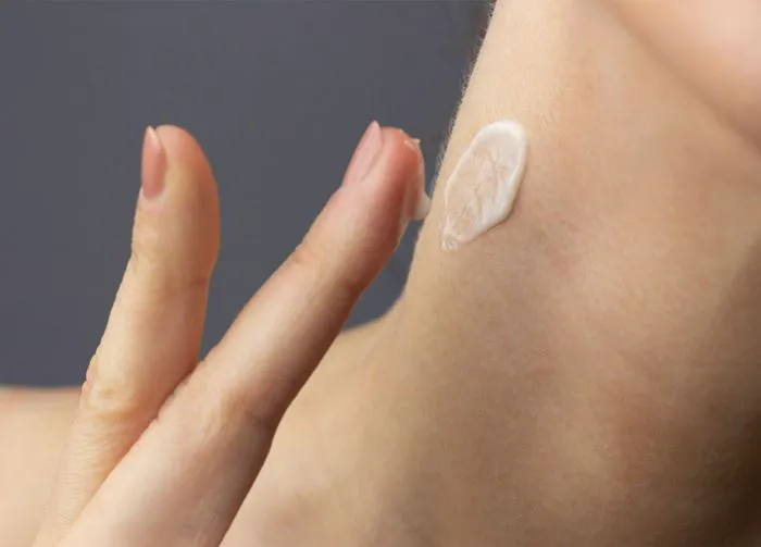 woman-applying-skincare