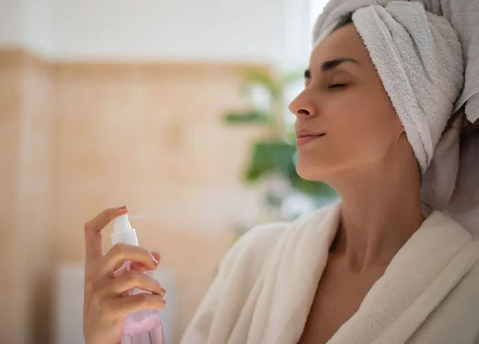 woman-using-setting-spray