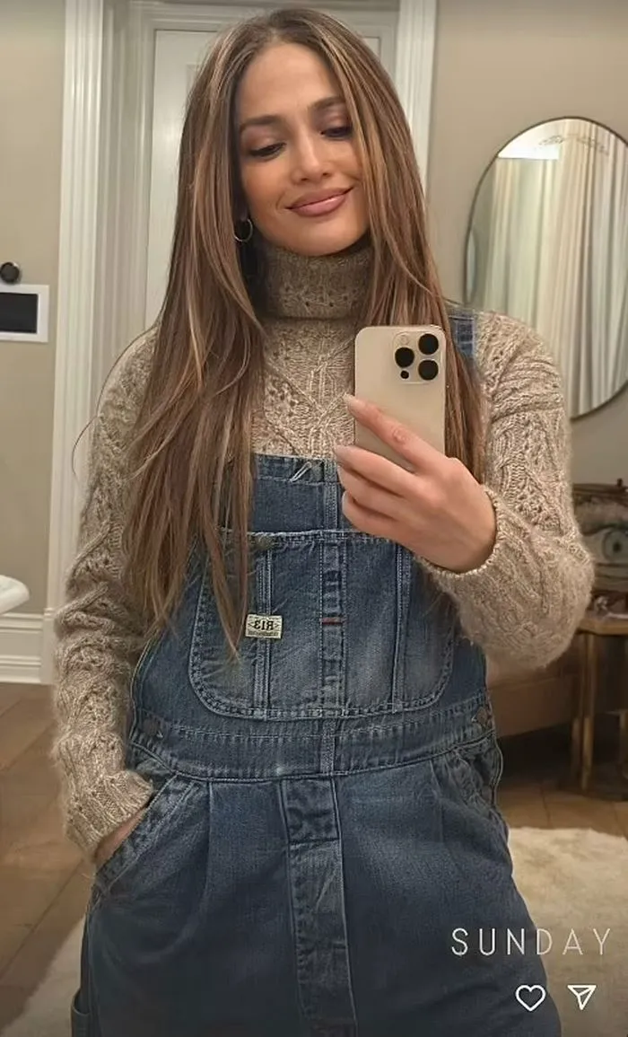 Jennifer Lopez mirror selfie in overalls