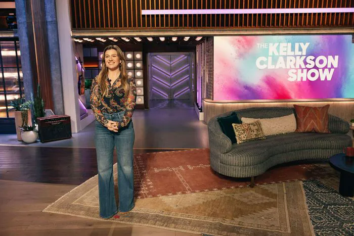 Kelly Clarkson hosting The Kelly Clarkson Show in bell bottoms