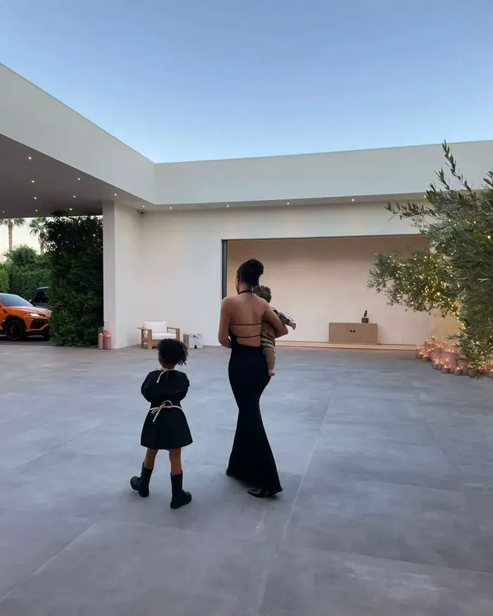 Kylie Jenner walks in the entryway of Palm Springs home