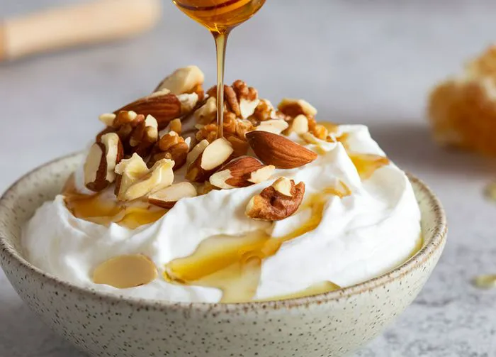 Bowl of Greek yogurt with honey
